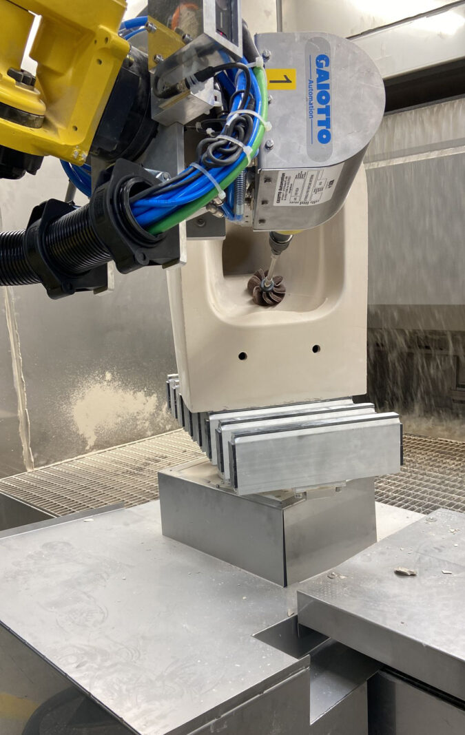 Sacmi RobotClean: automatic white finishing makes first appearance at Hidra Ceramica